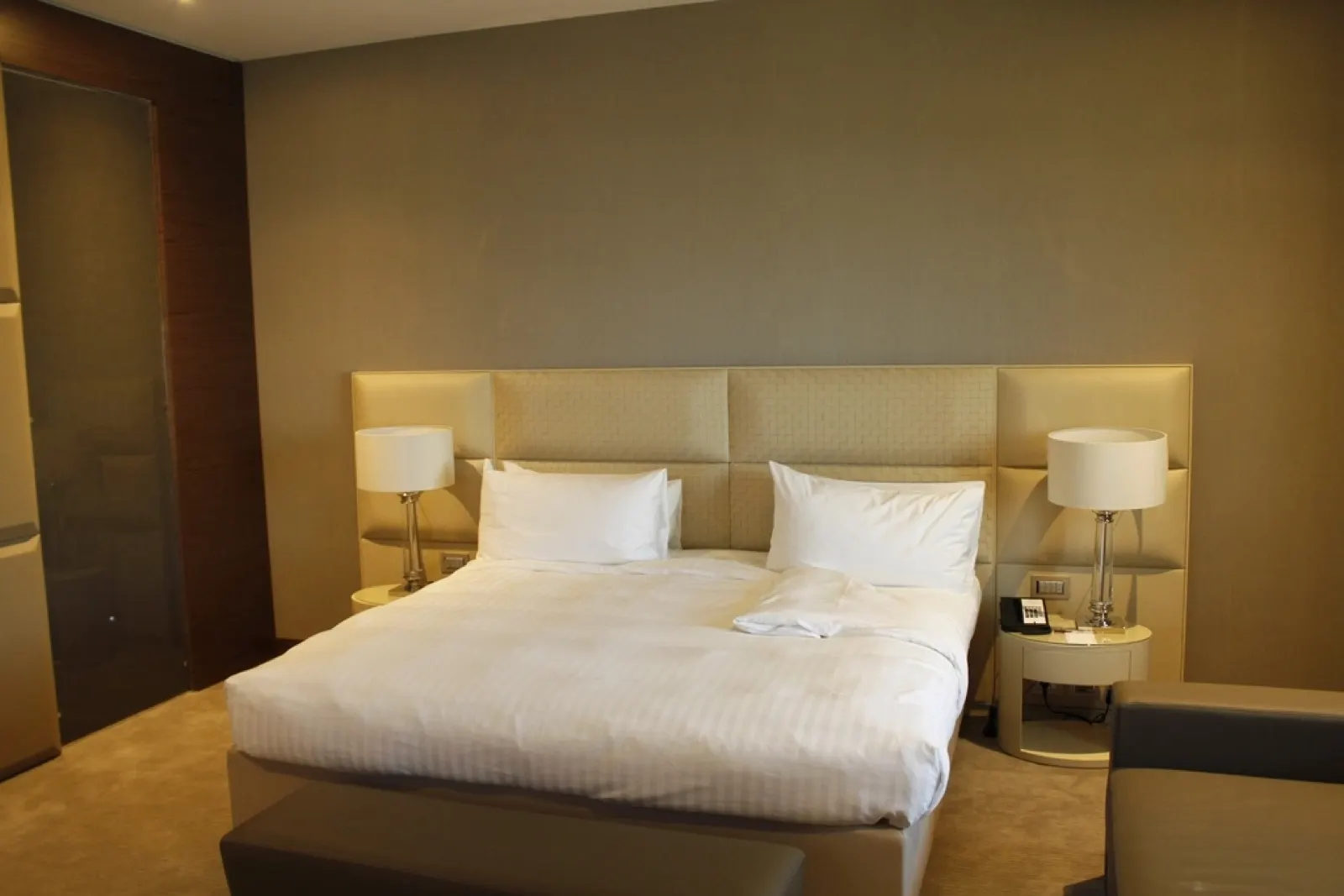 Warm, softly lit bedroom